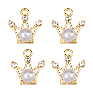 Detailed view of four golden crown pendants with white pearls and small zircons