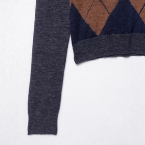 Men's retro knit polo shirt with grey, blue and brown diamond pattern and ribbed cuffs