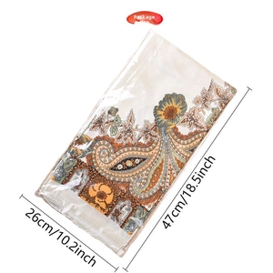 Detailed view of the 47cm x 26cm packaging for the paisley print silk scarf