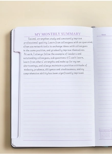 Macro detail of undated monthly summary page in A5 lavender notebook planner