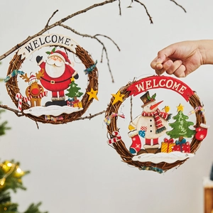 Handmade Christmas wreath set with Santa and Snowman figures on natural rattan rings