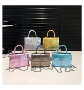 Five assorted metallic crocodile texture mini handbags with detachable silver chains