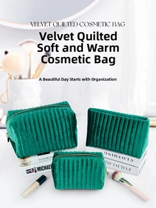 Three-piece set of emerald green quilted velvet makeup bags with golden zippers