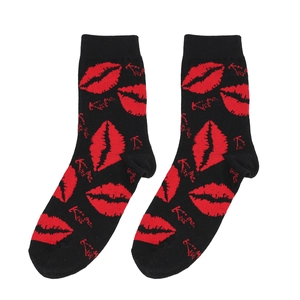 Detail of black mid-calf socks with red lip patterns and Kiss me text for Valentine Gift