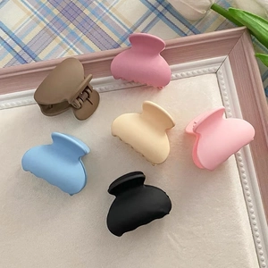 Set of 6 small matte hair claw clips in assorted colors for styling high pony tails