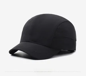 Detail of a black five-panel quick-dry baseball cap with short brim from a side view
