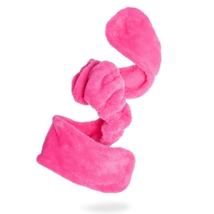 Detail of rose red velvet heatless hair curler showing soft plush texture and twist design