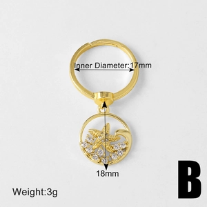 Detail shot of a starfish gold ring with 17mm inner diameter and 18mm pendant size