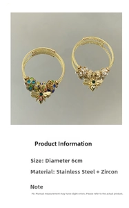 Detail view of 6cm adjustable gold bangle with bee charm and sparkling zircon beads