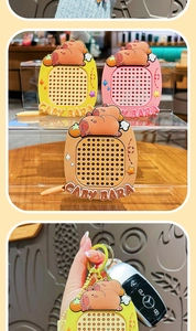 Close-up of silicone Capybara sensory fidget toy keychain in various pastel colors