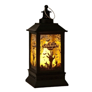 Retro Halloween LED candle lantern featuring spooky cemetery silhouettes and warm light