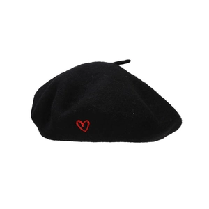 Classic black wool beret for women featuring a delicate red heart embroidery detail