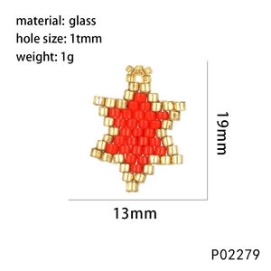Macro view of handmade red star-shaped glass bead pendant with size and weight info