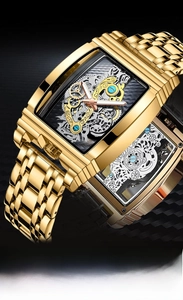Detail view of the mechanical gears and skeleton dial of this tonneau luxury watch