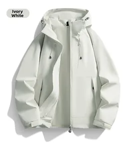 Detail of ivory windbreaker jacket featuring drawstring hood and velcro adjustable cuffs