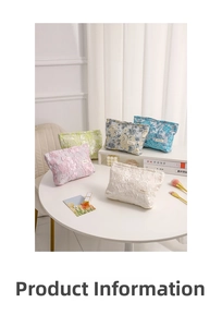 Detail of floral lace cosmetic bags in various colors with textured jacquard embroidery