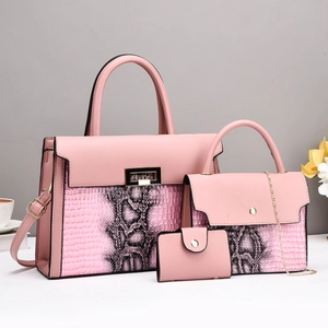 Pink faux snakeskin textured 3-piece bag set with tote, chain bag and coin purse