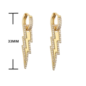 Detailed view of lightning bolt earrings with pavé cubic zirconia and 33mm length info