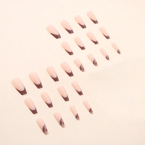 Long ballet press-on nails with nude base, dark brown French tips and marble texture