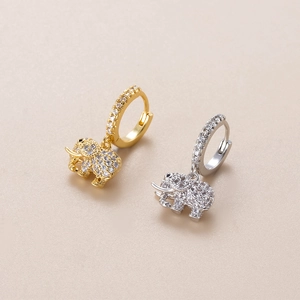 Close-up of elephant pendants with micro-pave cubic zirconia in gold and silver finishes