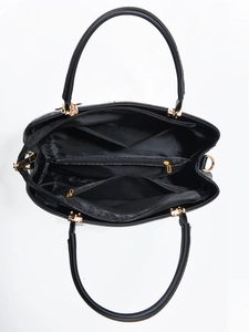 Top view of black PU tote bag interior showing compartments and golden hardware
