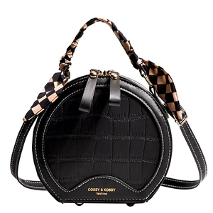 Black round PU leather crossbody bag with crocodile texture and silk scarf handle