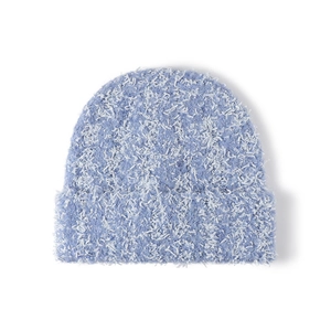 Blue and white fluffy knit beanie with thick fold-over cuff for winter warmth