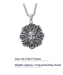 Detailed macro view of vintage sun god stainless steel pendant showing dimensions and weight