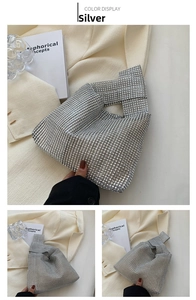 Detail of silver rhinestone bucket bag with sparkling crystals and knotted strap handle
