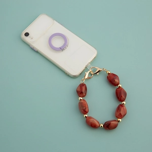 DIY irregular red acrylic stone phone wrist strap with gold beads and metal clasps