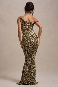 Detail shot of leopard print dress featuring a sexy open back and slim fishtail silhouette
