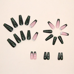 Emerald glitter ballerina fake nails set with rhinestones and black french tips design