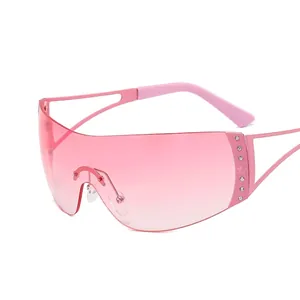Frameless pink gradient Y2K sunglasses with rhinestone star details and geometric frame