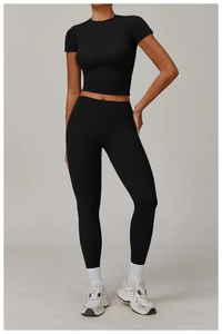 Detail view of the slim-fit black brushed yoga set with high-stretch performance fabric