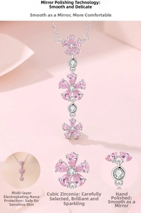 Detail view of S925 silver plum blossom pendant with pink cubic zirconia crystals