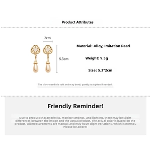 Detailed size specifications for vintage heart-shaped drop pearl earrings in gold