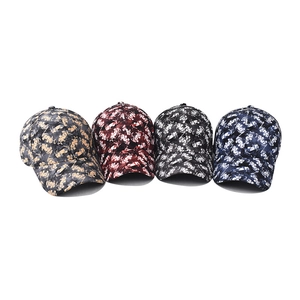 Four-pack of camouflage floral baseball caps in brown, red, grey, and blue colors