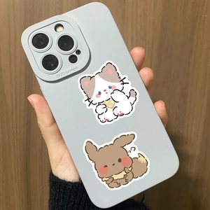 Close-up of a light gray silicone phone case with cute cartoon stickers on a wooden surface