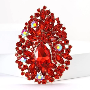 Vintage large waterdrop brooch with red crystals and iridescent gems on metal base