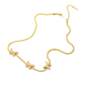 Detail of gold plated 3D butterfly pendants on a flat snake bone chain necklace
