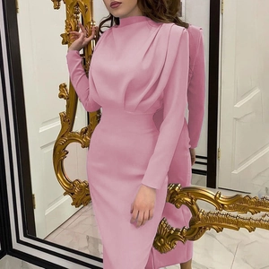 Detail view of pink long sleeve maxi dress featuring elegant pleated waist and high collar