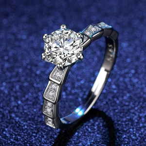 Macro shot of S925 sterling silver stamp and six-prong setting with brilliant round stone