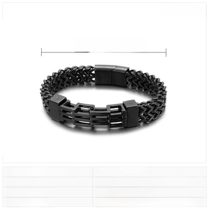 Detail of double-row stainless steel men's bracelet with magnetic clasp and black accents