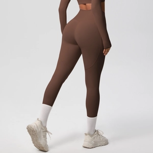 High-waist solid color brushed yoga leggings in dark coffee shown from a back view