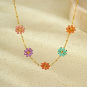18K gold plated stainless steel necklace featuring five colorful enamel daisy flowers