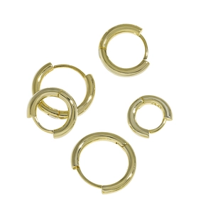 Set of five gold S925 sterling silver huggie hoop earrings on white background