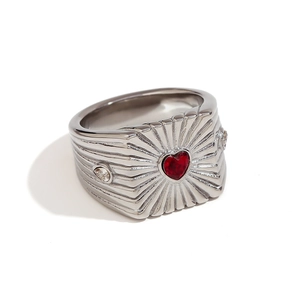 Silver steel ring with red heart gemstone and sunburst engraving on square face