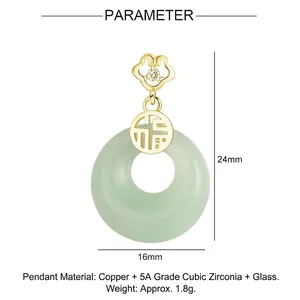Detailed view of gold copper pendant with 5A cubic zirconia and green glass inlay
