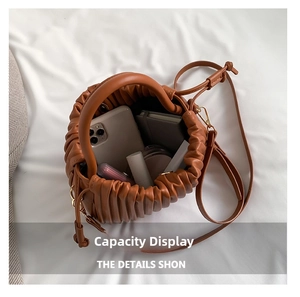 Interior view of the brown pleated PU leather bag showing its spacious capacity