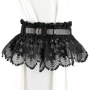 Detailed close-up of floral lace corset belt with black leather strap and gold metal buckle